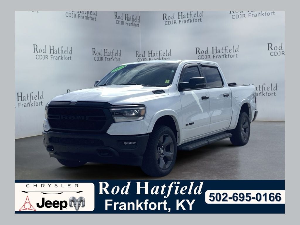 2023 RAM 1500 Big Horn Crew Cab 4x4 5'7' Box in Bright White Clearcoat — front three-quarter view