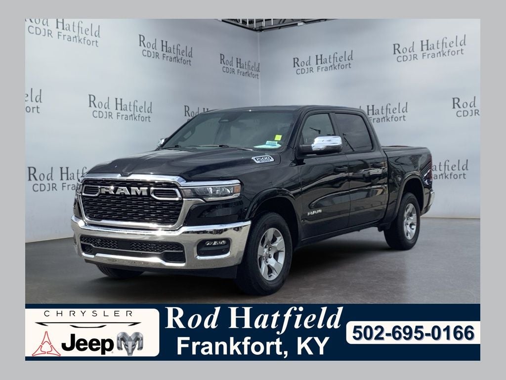 2025 RAM 1500 Big Horn in Diamond Black — front three-quarter view