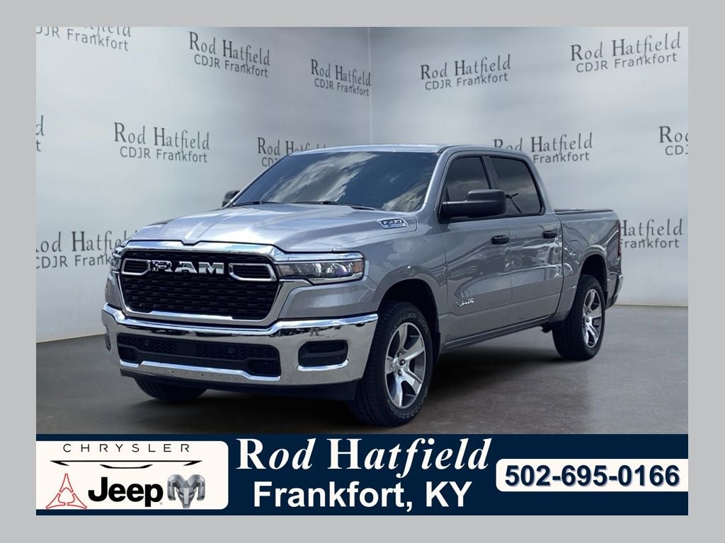 2025 RAM 1500 Tradesman in Billet Silver Metallic Clearcoat — front three-quarter view