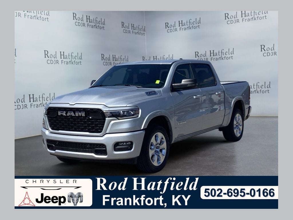 2026 RAM Ram 1500 RAM 1500 BIG HORN CREW CAB 4X4 5'7' BOX in Silver Zynith Exterior Paint — front three-quarter view