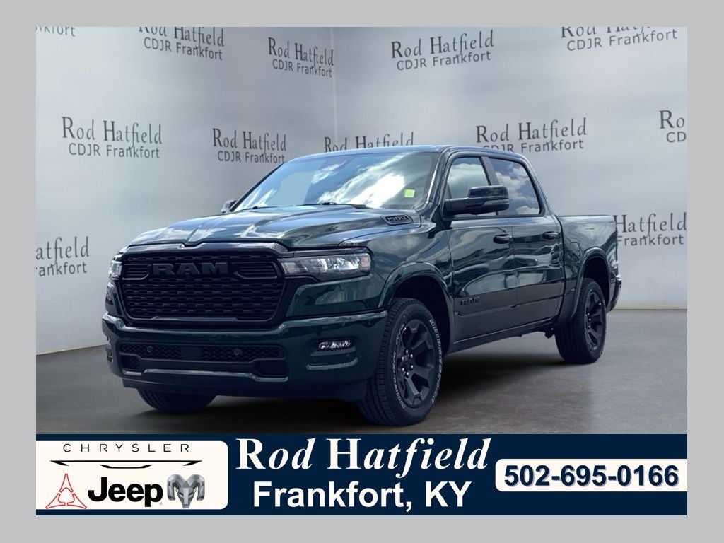 2026 RAM Ram 1500 RAM 1500 BIG HORN CREW CAB 4X4 5'7' BOX in Serrano-Green Metallic Exterior Paint — front three-quarter view