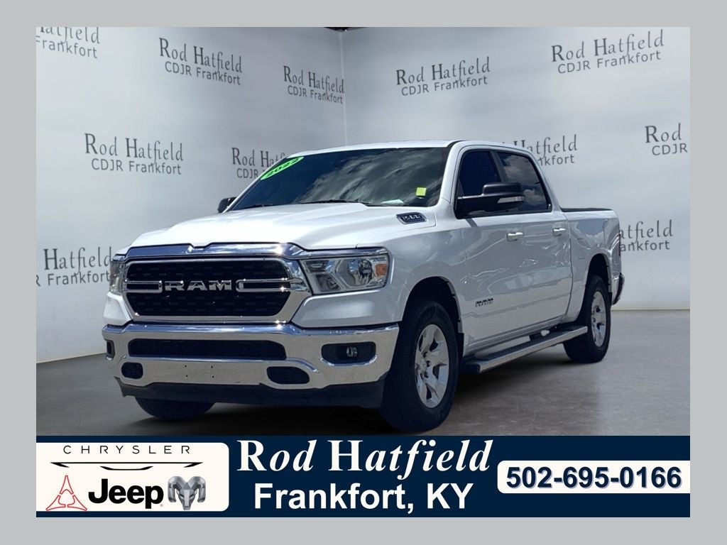 2022 RAM 1500 Big Horn Crew Cab 4x4 5'7' Box in Bright White Clearcoat — front three-quarter view