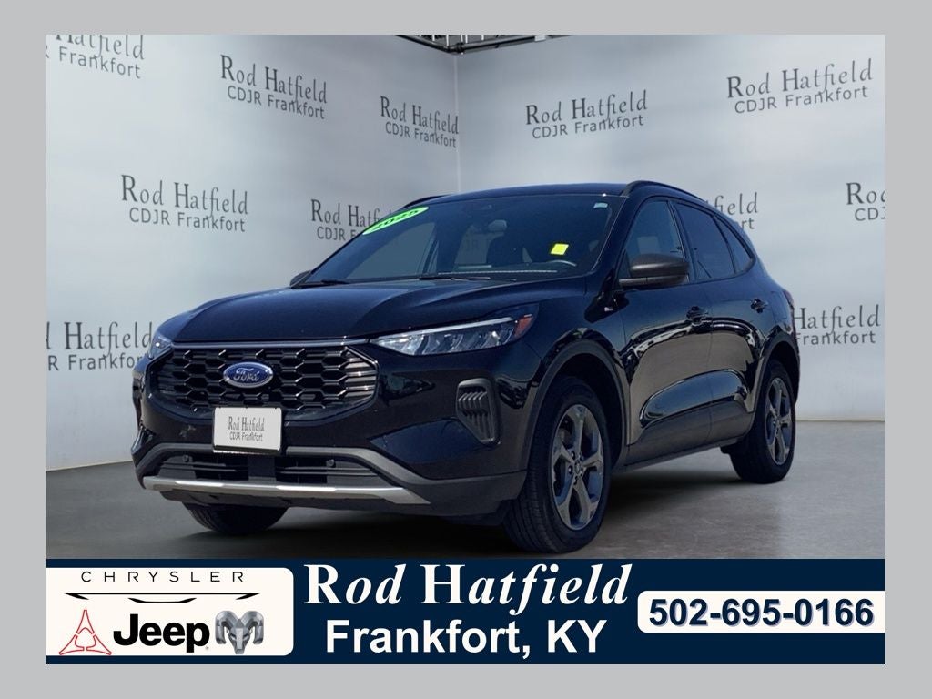 2025 Ford Escape ST-Line in Black Metallic — front three-quarter view