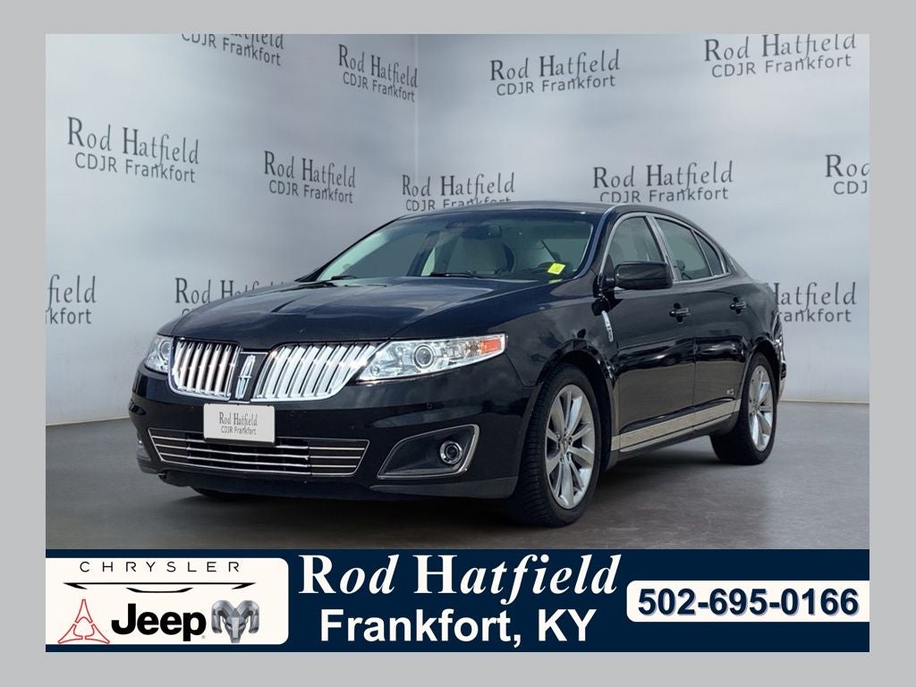 2011 Lincoln MKS Base in Tuxedo Black Metallic — front three-quarter view