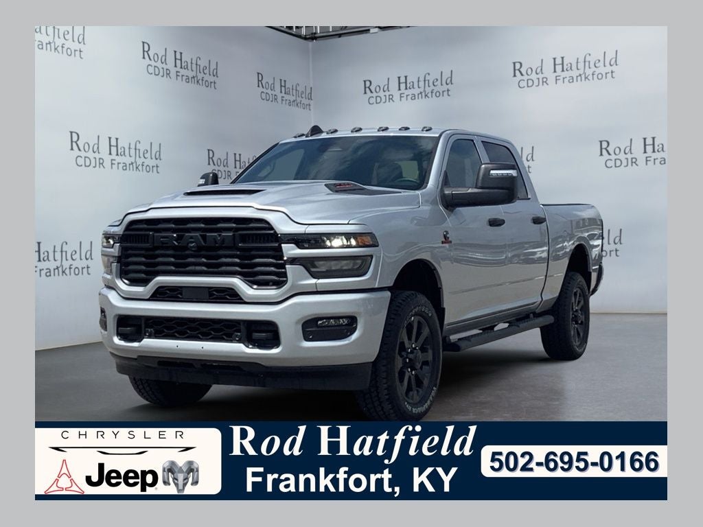 2026 RAM Ram 2500 RAM 2500 BLACK EXPRESS CREW CAB 4X4 6'4' BOX in Silver-Zynith Exterior Paint — front three-quarter view