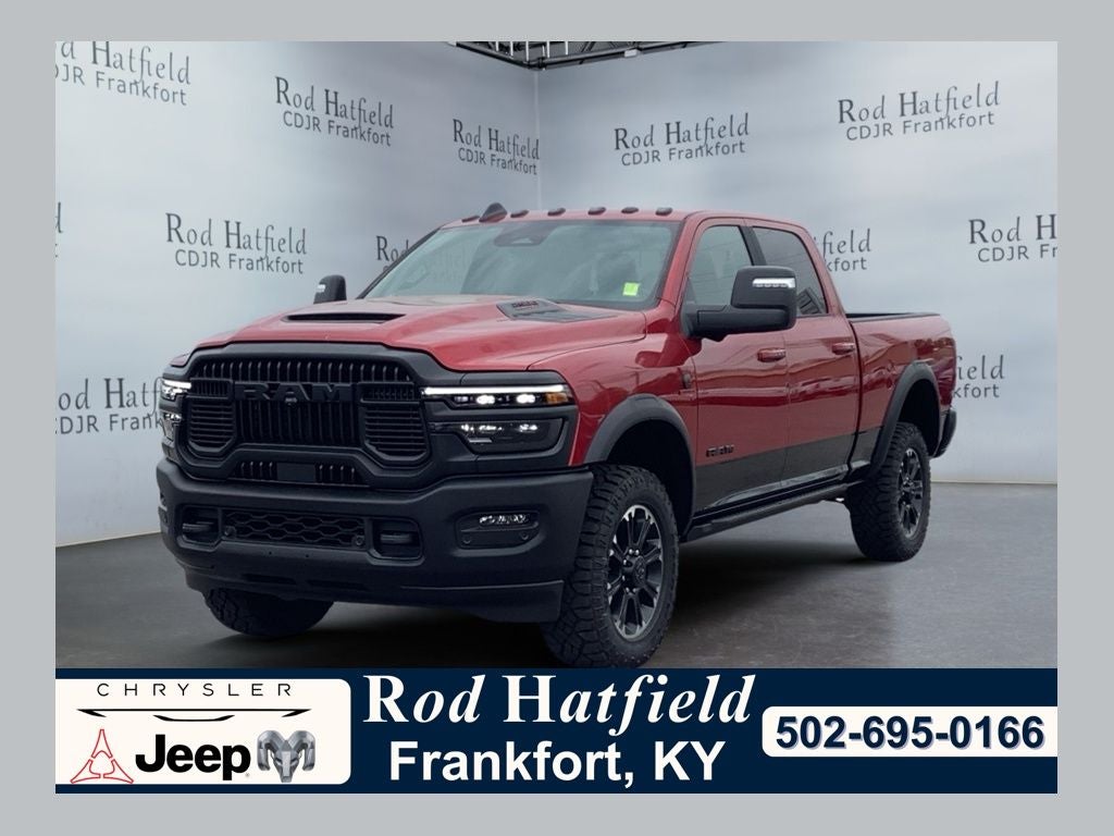 2026 RAM 2500 RAM 2500 REBEL CREW CAB 4X4 6'4' BOX in Molten Red Pearlcoat — front three-quarter view
