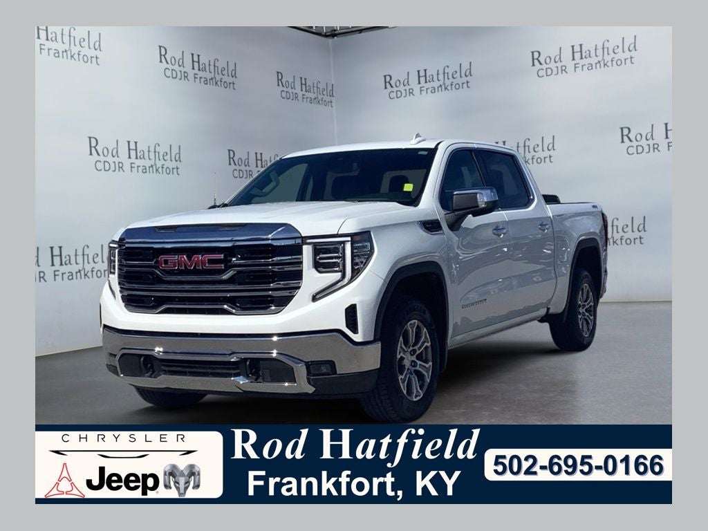 2025 GMC Sierra 1500 4WD Crew Cab Short Box SLT in Summit White — front three-quarter view