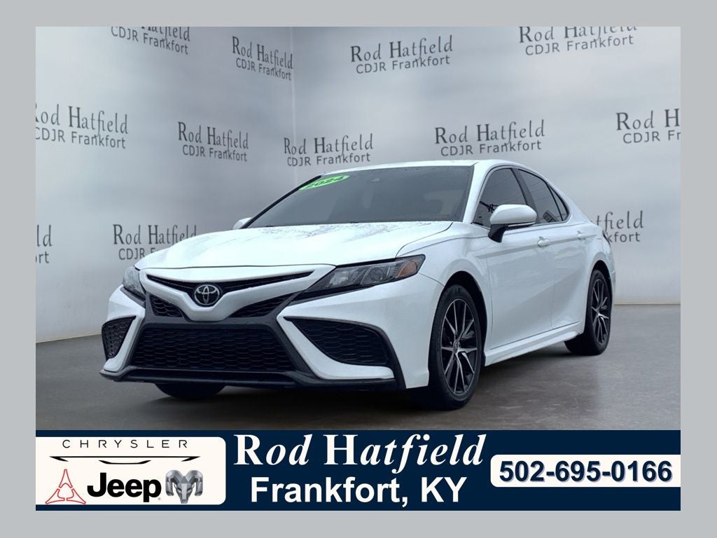 2024 Toyota Camry SE in Ice Cap — front three-quarter view