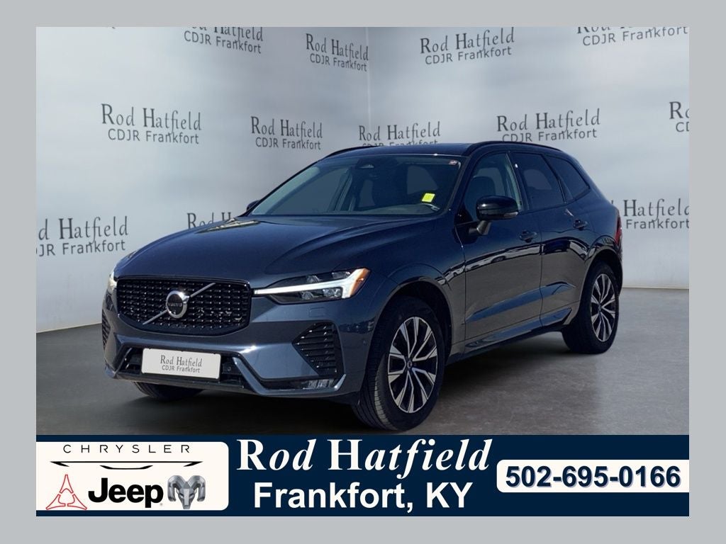2024 Volvo XC60 B5 Plus Dark Theme in Denim Blue Metallic — front three-quarter view